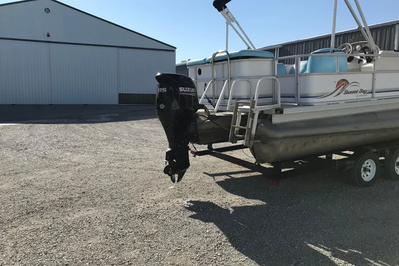 Slide: The Image of 2006 Sunset Bay CRUISE DELUXE pontoon boat with Suzuki motor on trailer. - 7