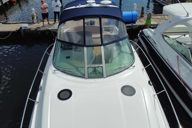 Slide: The Image of 2002 Sea Ray 320 Sundancer docked at marina, aerial view. - 13