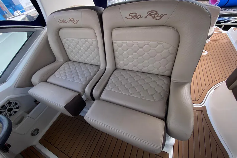 Slide: The Image of Luxury seating on 2002 Sea Ray 320 Sundancer boat, featuring elegant design and comfort. - 31