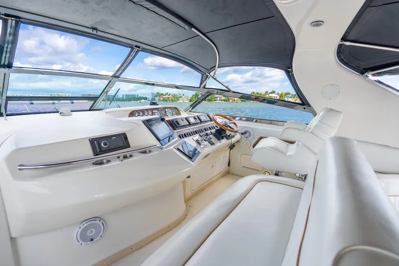 Slide: The Image of Luxurious 1998 Sea Ray 450 Sundancer yacht interior with modern helm and panoramic views. - 26