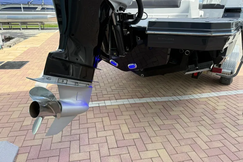 Slide: The Image of Stern view of 2018 Monterey M-65 boat with propeller and outboard motor. - 10