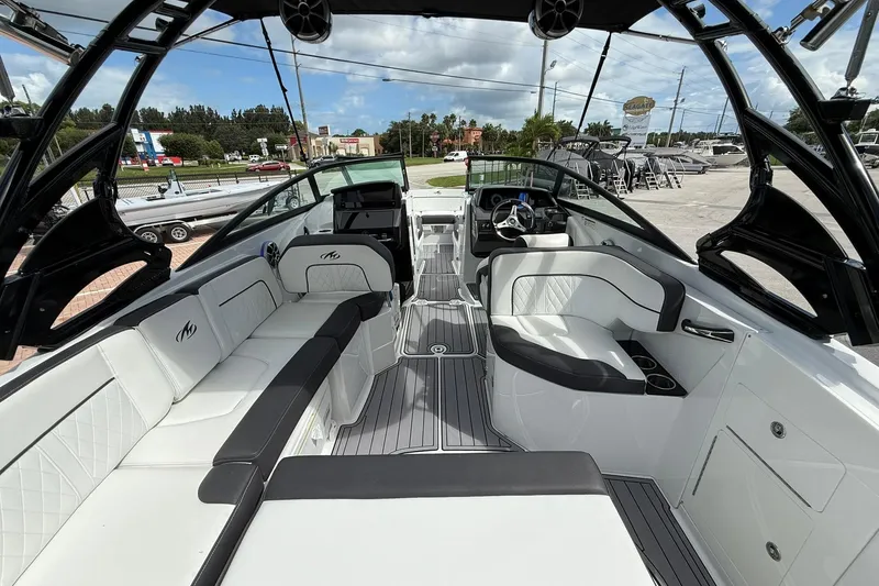 Slide: The Image of Luxurious interior of a 2018 Monterey M-65 boat with white seating and modern design. - 24