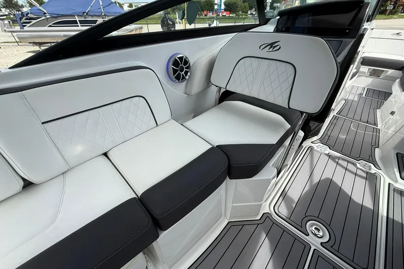 Slide: The Image of Luxurious seating on a 2018 Monterey M-65 boat with stylish upholstery and modern design. - 26