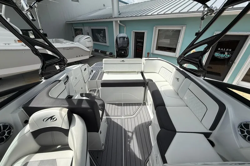 Slide: The Image of Luxurious interior of a 2018 Monterey M-65 boat with spacious seating and modern design. - 27