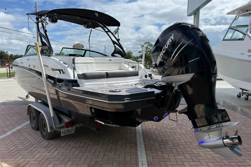 Slide: The Image of 2018 Monterey M-65 boat with Mercury Verado engine on a trailer. - 4