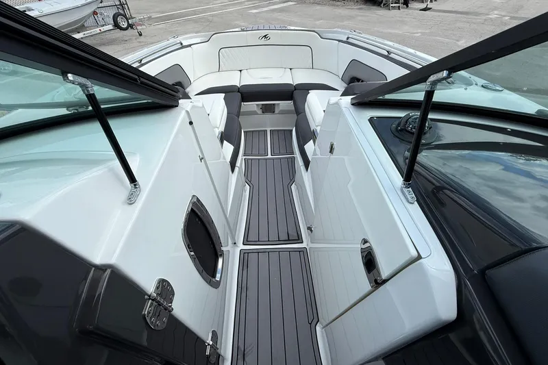 Slide: The Image of 2018 Monterey M-65 boat interior with sleek seating and modern design. - 42