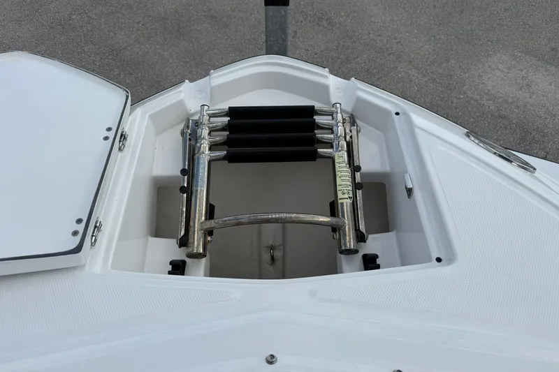 Slide: The Image of Bow view of 2018 Monterey M-65 boat with retractable ladder. - 47