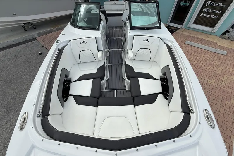 Slide: The Image of Luxurious seating area of a 2018 Monterey M-65 boat with stylish upholstery. - 48