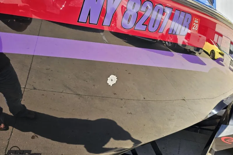 Slide: The Image of 2005 Baja 25 Outlaw boat with registration number NY 8207 MB displayed. - 28