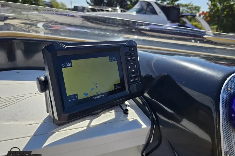 Slide: The Image of Garmin GPS on 2005 Baja 25 Outlaw boat dashboard, sunny day. - 70
