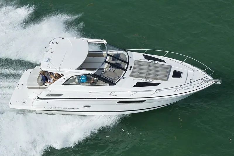 Slide: The Image of 2016 Regal 35 Sport Coupe cruising on water. - 57