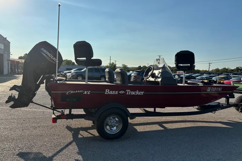 Slide: The Image of 2024 Bass Tracker XL boat trailer hitch and rear detail in sunlight. - 16