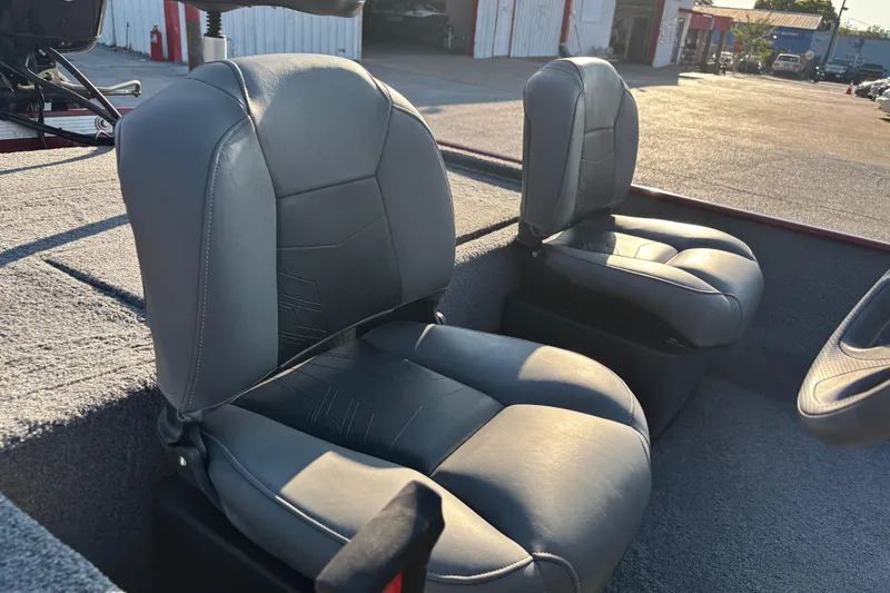 Slide: The Image of 2024 Bass Tracker XL boat with NOCO Genius GEN5X2 battery charger and red power switch. - 21