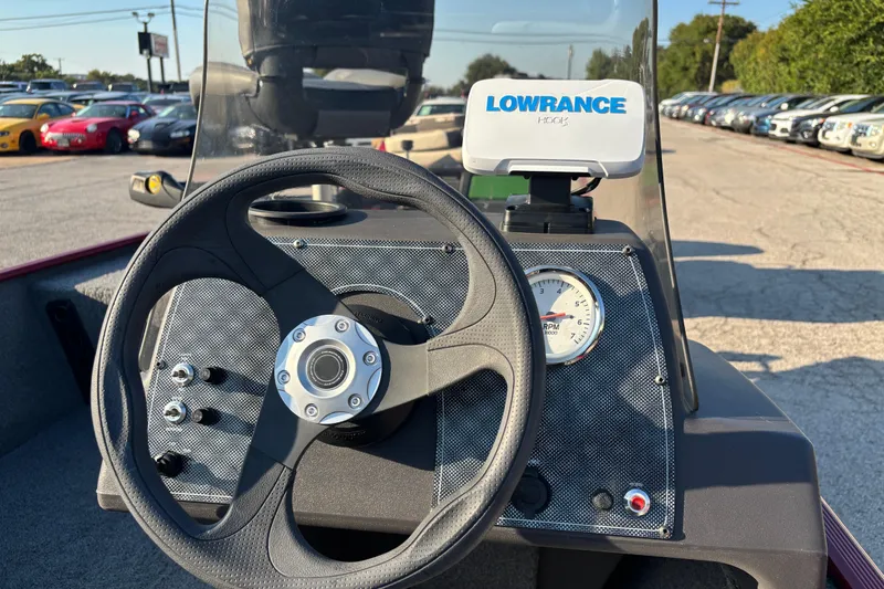 Slide: The Image of 2024 Bass Tracker XL boat battery compartment with Interstate batteries and fuel tank. - 22