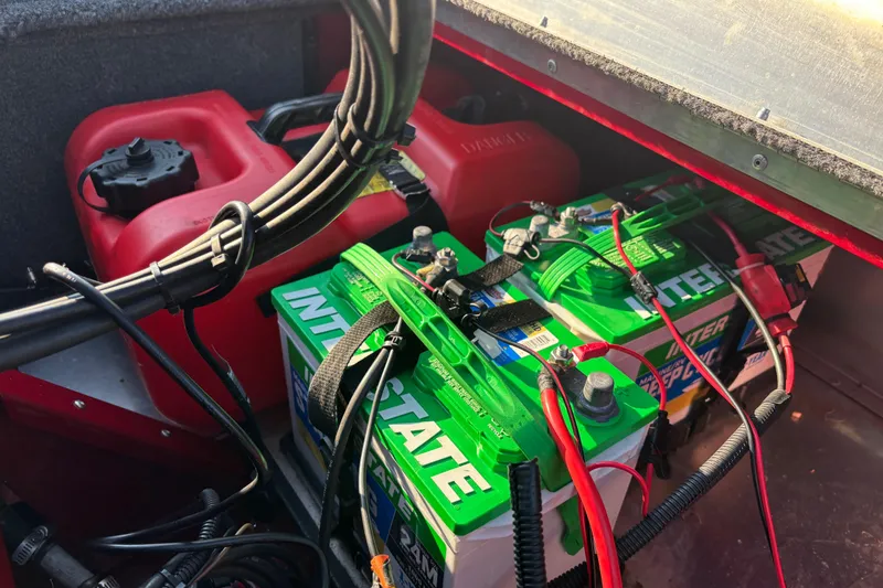 Slide: The Image of 2024 Bass Tracker XL boat with "Fish the Finest" and Premier Boating Centers logos. - 24