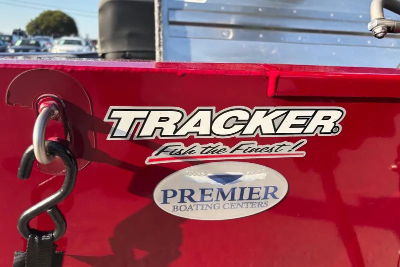 Slide: The Image of 2024 Bass Tracker XL boat capacity label, U.S. Coast Guard compliance, 3 persons or 555 lbs. - 28