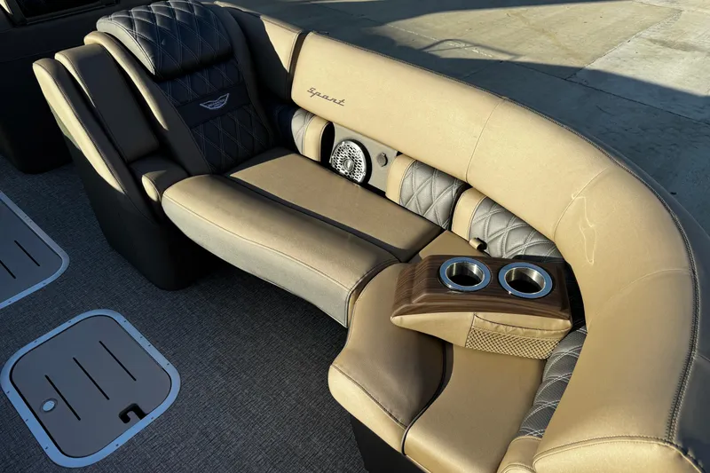 Slide: The Image of Luxurious seating on 2025 Bennington 23RSB boat with cup holders and premium upholstery. - 15