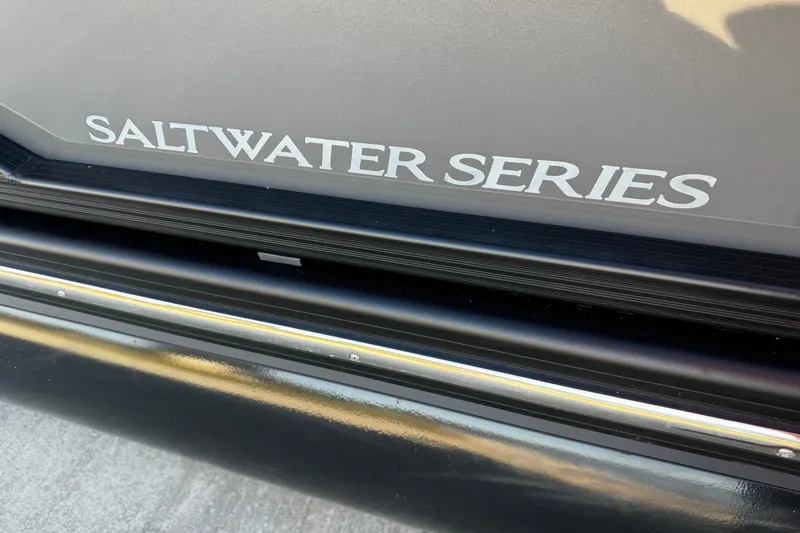 Slide: The Image of 2025 Bennington 23RSB Saltwater Series boat detail with sleek design. - 5