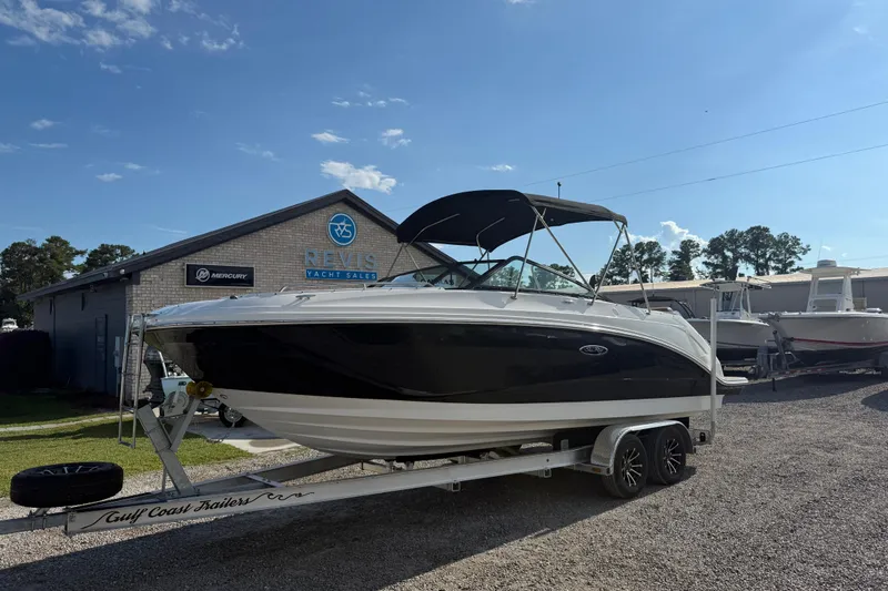 Slide: The Image of 2019 Sea Ray SDX 250 Outboard boat on trailer at dealership. - 53