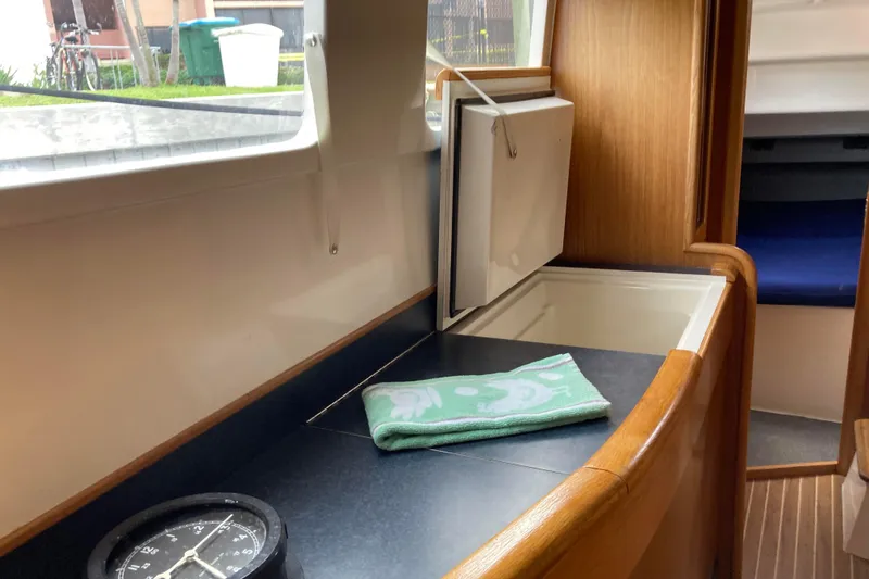 Slide: The Image of Interior of 2009 Seawind 36 1000XL yacht with countertop and compass. - 22