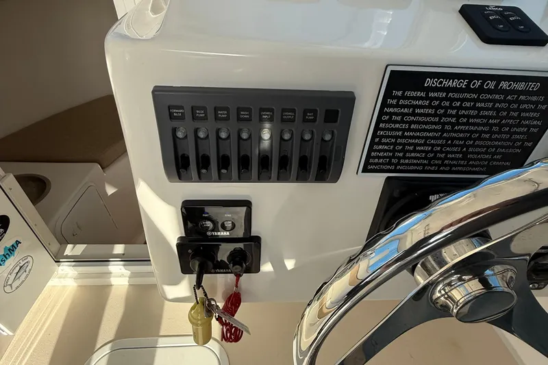 Slide: The Image of Control panel of a 2014 Steiger Craft 26' Miami boat with Yamaha switches. - 10