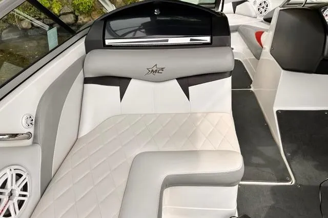 Slide: The Image of 2009 MasterCraft X-15 boat interior with stylish seating and speaker system. - 14