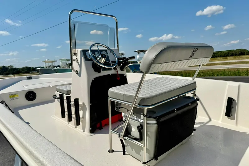 Slide: The Image of 2025 Carolina Skiff EV198 Sea Skiff interior with steering console and seating. - 22