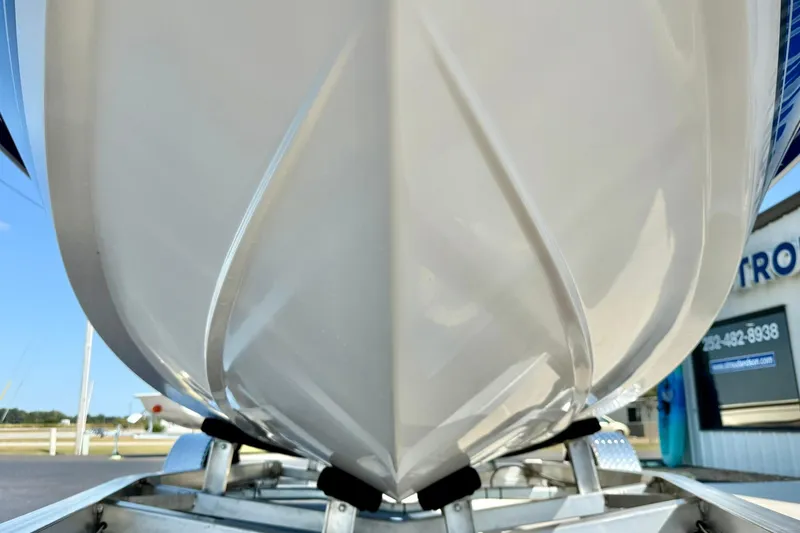 Slide: The Image of 2025 Carolina Skiff EV198 Sea Skiff hull on trailer, close-up view. - 9