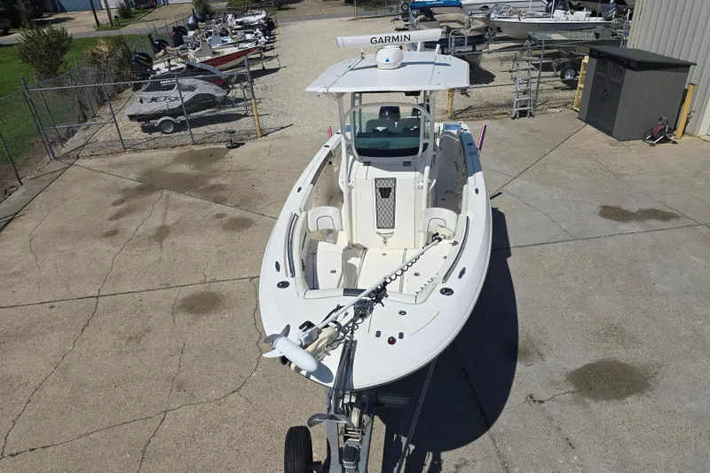 Slide: The Image of 2019 Wellcraft 262 Fisherman boat on trailer, equipped with Garmin electronics. - 13