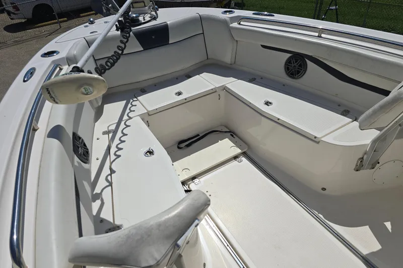 Slide: The Image of 2019 Wellcraft 262 Fisherman boat interior with seating and storage compartments. - 18