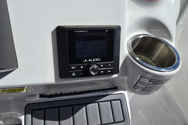 Slide: The Image of JL Audio system and cup holder on 2024 Tidewater 220 CC Adventure boat. - 18