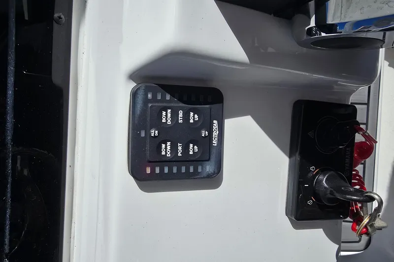 Slide: The Image of Control panel on 2024 Tidewater 220 CC Adventure boat dashboard. - 20