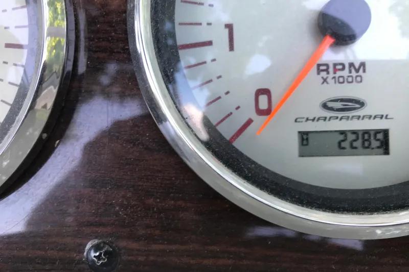 Slide: The Image of Close-up of 2005 Chaparral Signature 260 RPM gauge displaying 2289 hours. - 19