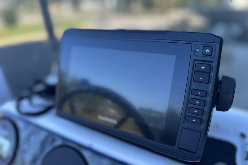 Slide: The Image of Garmin GPS device on 2017 G3 Bay 18 DLX boat dashboard. - 1