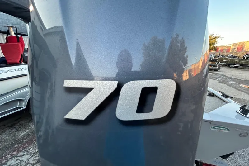 Slide: The Image of 2017 G3 Eagle 170 PFX boat with Yamaha motor on trailer, parked outdoors. - 2