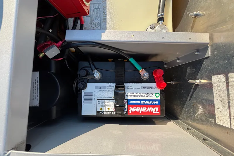 Slide: The Image of Battery compartment of 2017 G3 Eagle 170 PFX with Duralast marine battery. - 36