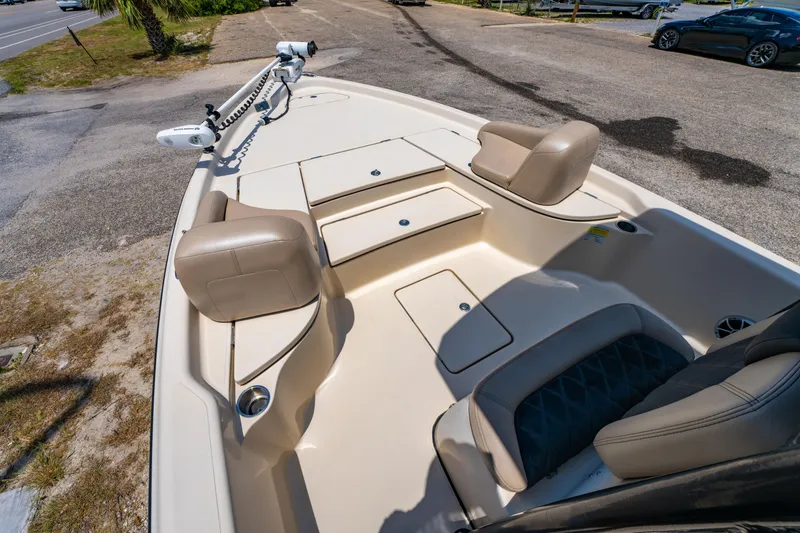 Slide: The Image of 2020 Blue Wave 2400 PureBay boat interior with seating and storage compartments. - 10