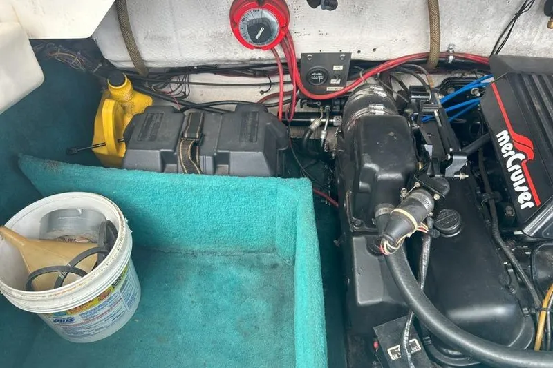 Slide: The Image of Engine compartment of a 1991 Wellcraft 216 Eclipse boat with MerCruiser components. - 12