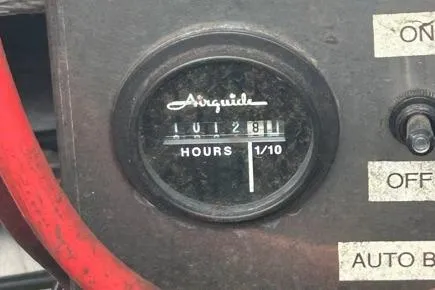 Slide: The Image of Hour meter on 1991 Wellcraft 216 Eclipse boat dashboard, showing 1281.1 hours. - 14