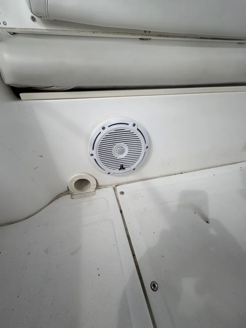 Slide: The Image of Boat interior with speaker on a 2004 Boston Whaler 220 Dauntless. - 12