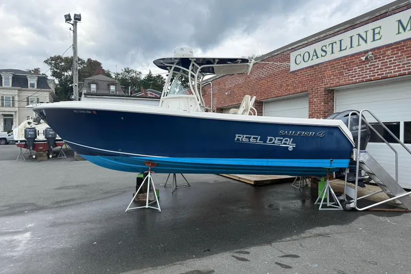 Slide: The Image of 2019 Sailfish 270 CC boat on stands at Coastline Marina. - 3