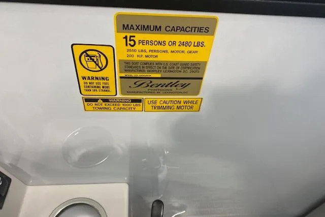 Slide: The Image of Bentley Pontoons Legacy 223 Navigator 2026 capacity label, 15 persons or 2480 lbs. - 10