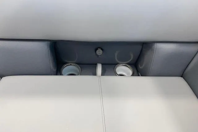 Slide: The Image of 2026 Bentley Pontoons Legacy 223 Navigator interior with cup holders and sleek seating. - 7