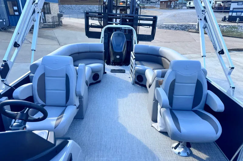 Slide: The Image of 2026 Landau Island Breeze 25 pontoon boat interior with plush seating and modern design. - 13
