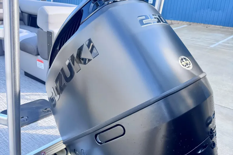 Slide: The Image of Suzuki 250 outboard motor on 2026 Landau Island Breeze 25 pontoon boat. - 4