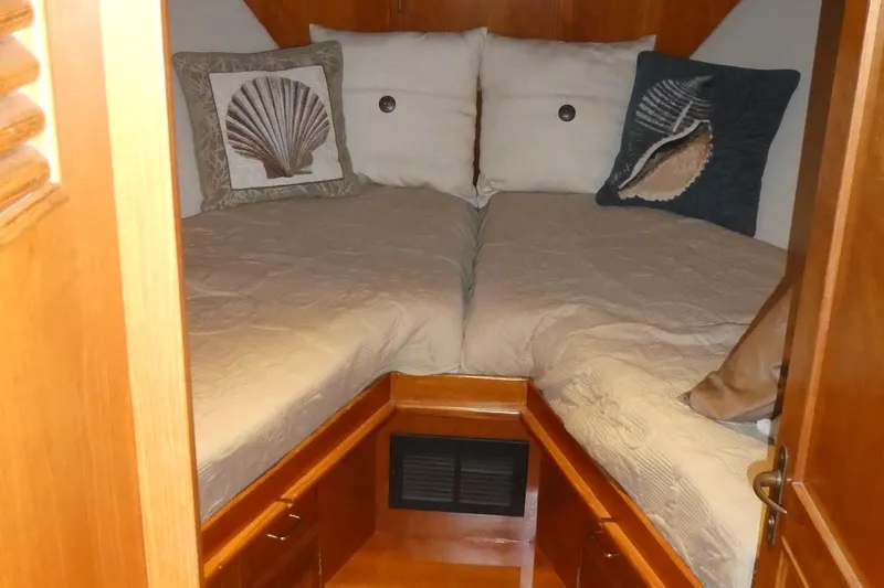 Slide: The Image of Cozy cabin interior of 1992 Ocean Alexander 456 Classicco yacht with decorative pillows. - 18