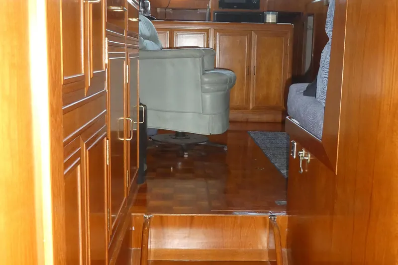 Slide: The Image of Interior of 1992 Ocean Alexander 456 Classicco yacht with wooden cabinetry and seating. - 23