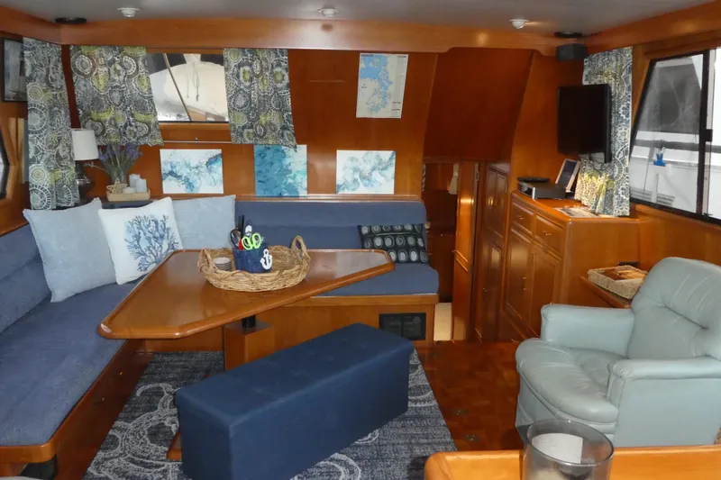 Slide: The Image of Luxurious 1992 Ocean Alexander 456 Classicco yacht interior with cozy seating and elegant decor. - 24