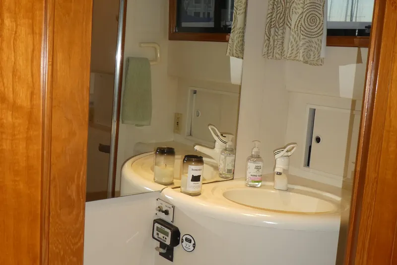 Slide: The Image of Bathroom interior of 1992 Ocean Alexander 456 Classicco yacht with sink and toiletries. - 28