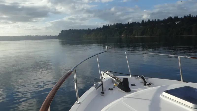 Slide: The Image of Ocean Alexander 456 Classicco 1992 cruising on calm waters with scenic forested shoreline. - 3